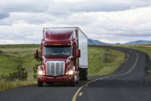 Truck on a highway reflecting fast warehouse solutions, cross-docking and logistics by Axis Warehousing near Birmingham